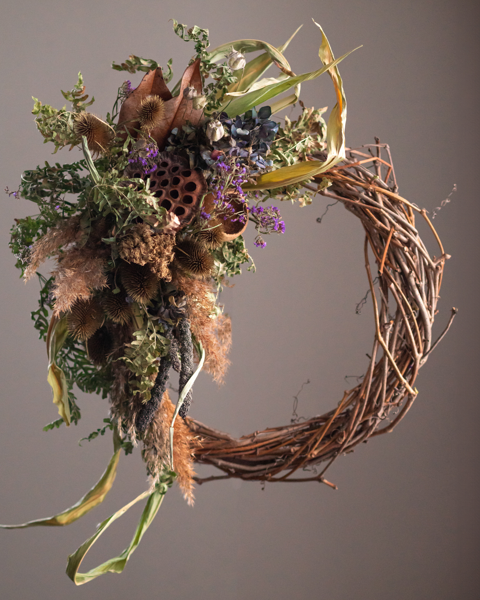Dried flower wreath with natural grapevine and layered dried flowers